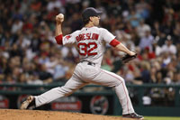 Craig Breslow pitching for the Red Sox